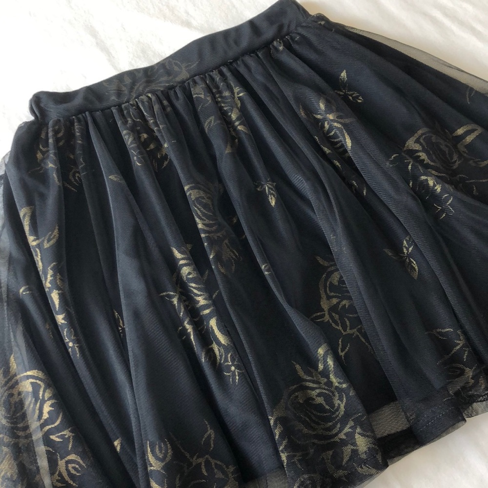 Tulle skirt with gold accents